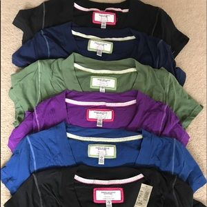 8 American Eagle tees.